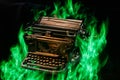 Concept shot of antique manual typewriter with paper burning on black background, selective focus Royalty Free Stock Photo