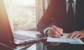 The concept is Signing a contract, business agreement, and deal concept. Businessman reading before signing business contract Royalty Free Stock Photo