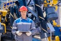 Concept smart online Industry. Offshore worker inspect with tablet drilling rig for exploration of minerals for oil, gas