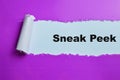 Concept of Sneak Peek Text written in torn paper Royalty Free Stock Photo