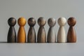 Concept of social inclusion, diversity, and equality using small wooden figures. Royalty Free Stock Photo