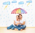 Concept: social protection of family. family took refuge from m Royalty Free Stock Photo
