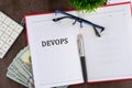 Concept for software engineering culture and practice of software development. DEVOPS word It is written in a business