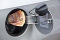 Concept South African Banknotes Feeding Into Petrol Tank