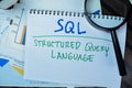 Concept of SQL - Structured Query Language write on book isolated on Wooden Table Royalty Free Stock Photo