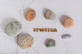Concept stoicism word made from letters and stones around on a gray background top view