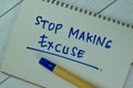 Concept of Stop Making Excuse write on a book isolated on Wooden Table