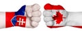 Two hands are clenched into fists and are located opposite each other. Hands painted in the colors of the flags of the countries.