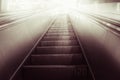 Concept of success in business, moving up the career path. Underground Escalator Conveor in Subway Royalty Free Stock Photo