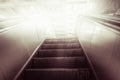 Concept of success in business, moving up the career path. Underground Escalator Conveor in Subway Royalty Free Stock Photo