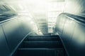 Concept of success in business, moving up the career path. Underground Escalator Conveor in Subway Royalty Free Stock Photo