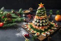 Sushi on a wooden plate in the form of a Christmas tree with copy space Royalty Free Stock Photo