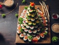 Sushi on a wooden plate in the form of a Christmas tree Royalty Free Stock Photo