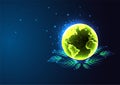 Concept of sustainable development with green Earth globe and leaves in futuristic glowing on blue Royalty Free Stock Photo