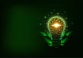Concept of Sustainable, renewable energy with glowing light bulb and green leaves