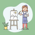 Concept Of Talents And Hobbies. Art school or studio. Young Woman Is Painting Beautiful Picture On Easel. Artist Paints Royalty Free Stock Photo
