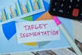 Concept of Target Segmentation write on sticky notes isolated on Wooden Table Royalty Free Stock Photo