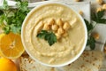 Concept of tasty eat with bowl of hummus, top view