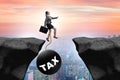 Concept of tax burden with businesswoman over chasm