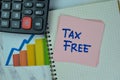 Concept of Tax Free write on sticky notes isolated on Wooden Table Royalty Free Stock Photo