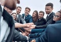 Large group of business people standing with folded hands together Royalty Free Stock Photo