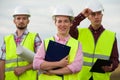 Concept of engineers and windmills Royalty Free Stock Photo
