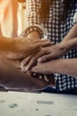 Concept of teamwork: Close-Up of hands business team showing unity with putting their hands together Royalty Free Stock Photo
