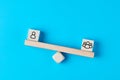 Concept of teamwork, cooperation, collaboration or alliance against individuality. Imbalanced wooden seesaw with team and Royalty Free Stock Photo