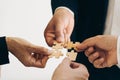 The concept of teamwork and partnership. Businessman's hands putting together Royalty Free Stock Photo