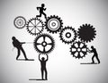 Concept of Teamwork, people building gear wheels, this also represents business partnership, unity, team working . Royalty Free Stock Photo