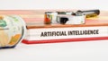 The concept of technology and development. Phrase, word, text ARTIFICIAL INTELLIGENCE on the end of the book, front view Royalty Free Stock Photo