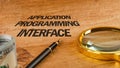 The concept of technology and development. Phrase, words, text APPLICATION PROGRAMMING INTERFACE text API written on Royalty Free Stock Photo