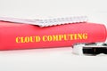 The concept of technology and development. Phrase, words, text CLOUD COMPUTING on the end of the book cover Royalty Free Stock Photo