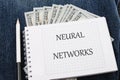 The concept of technology and development. Phrase, words, text NEURAL NETWORKS on a blank sheet of notepad against the