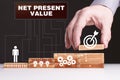 The concept of technology, the Internet and the network. Businessman shows a working model of business: Net present value