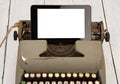 Concept of technology progress - old typewriter and new tablet p Royalty Free Stock Photo