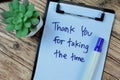 Concept of Thank You For Taking The Time write on paperwork isolated on Wooden Table Royalty Free Stock Photo