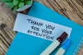 Concept of Thank You For Your Attention write on sticky notes isolated on Wooden Table