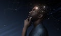 Thoughtful african man with illustration of brain activity process
