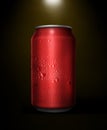 Concept of thirst and quenching thirst. Red metal can with cola or beer. Drops of condensation on the surface Royalty Free Stock Photo