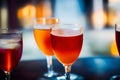 Three Glasses Of Wine Sitting On Top Of A Table. Generative AI Royalty Free Stock Photo