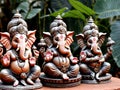 Three Small Statues Of Elephants. Generative AI Royalty Free Stock Photo