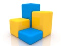 Concept of toy cubes in blue and yellow Royalty Free Stock Photo