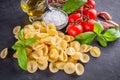 Concept of traditional italian pasta with tomatoes and basil