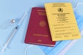 Concept for travel restrictions without corona virus vaccination with certificate of vaccination German travel passport