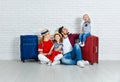 Concept travel and tourism. happy family with suitcases Royalty Free Stock Photo