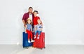 Concept travel and tourism. happy family with suitcases near w Royalty Free Stock Photo