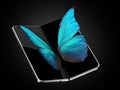 Concept of two foldable smartphone folded and placed next to each other with butterfly image on screens. Flexible smartphone