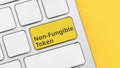 Concept type of cryptographic non-fungible tokens on the keyboard button