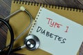 Concept of Type 1 Diabetes write on sticky notes with Stethoscope isolated on Wooden Table Royalty Free Stock Photo